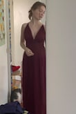 Other than being super long it fits perfectly and is a beautiful colour! i love the deep v-neck and tulle overlay and somehow manages to make me look tall (my favourite benefit) - Sylvia K.