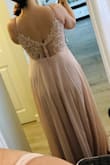 I love this dress. The back is so pretty and dainty. It does show a lot of cleavage but has good support. It is long for my height so I had to get it hemmed. - Aaron L.