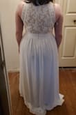 This dress was good quality, had a flattering fit, and was comfortable. It was way too long on me and felt too simple for my wedding dress. - Stacie R.