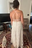 This dress was in my top three! It was actually a bit shorter than I wanted it, I'm also 5'9 so that happens a lot. It was surprisingly light for the lace on top and I loved the back. Part of the reason, outside of it being slightly too short, It wasn't my top pick is because I have no idea what bra would have worked with this dress. Most likely a stick on, which is a bit of a risk in the Florida heat and humidity. - Rose W.