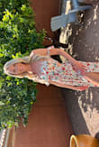 This is the perfect spring dress. I'm obsessed and wear it as often as possible. The slits are high so be careful of wind. - Ashley T.