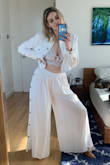Love these pants! Extremely comfortable with an elastic waistband, they can be dressed up or down.
Material is breathable, though it can become slightly see-through in direct sunlight (not enough to be an issue for me).
*Note: the fabric between the buttons down the side is open, not a closed seam. Wrinkles disappeared w a steamer. - Kat N.