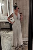 Runs large so I ordered one size down for a snug fit. Looked amazing. Good quality. Wore it to a great gatsby party and got a ton of compliments. - Seana Y.