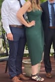 I love this dress!! The material is very nice and quality. The color is amazing, and the dress overall is very flattering. I love the tie detail on the front. Would definitely buy in multiple colors! - Alyssa M.