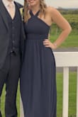 This dress is perfect for a wedding! I actually have this dress in 2 different colors because I love it so much! Quality material, not see-through at all. I ordered a small, and the top fit tight enough that I could not wear a bra and still felt very comfortable and supported. - Alyssa M.
