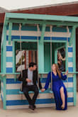 I bought this dress for my engagement photoshoot and I absolutely LOVE it! I wound up wearing it to a friend's engagement party a few weeks later. This dress is so comfortable, nice, and lightweight but also the sleeves do help to keep you warm if it's cool. Nothing was too tight! The waistband is thin elastic and stretches. The slit was not too tall or revealing. If they had this dress in black I would be buying a 2nd color! - Amanda B.