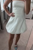 I loved the top and waist and how it all fit, but the poof on the bottom I wasn't sure about. I steamed it to get an accurate look and I felt like I was wearing a diaper in the back. My fiancé and a best friend thought so too. Wanted to love it but wasn't 100% on the bottom. - Olivia C.