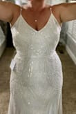 We are celebrating 25 wedding anniversary and renewing our vows in July. S, excited to wear. I will need to have the straps changed due to needing them to adjust all the way towards the front. Works great with 3-inch heels to not have it hemmed. - Nikole M.