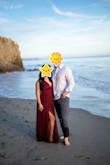 I bought this dress for my engagement photo shoot on the beach and it was perfect. It really suited the beach atmosphere and the color is gorgeous! The waist area of the dress was a bit tight because the dress closes a little bit lower on your back but my wider hips had no problems in this dress as it flows from the waist down. The dress was definitely too long for me and the slits came up way too high so I had the length hemmed and also closed up the slits a bit. But overall, I really liked the dress and will definitely be wearing it again! - Carol P.