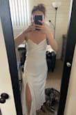I got this dress for my rehearsal dinner and was stunned at how well it fit! I struggle with clothes being too big but it was perfect! And the buttons are so cute! The material is great and the slit is nice too. Seriously can't rave enough about this dress. I can't wait to wear it for my rehearsal dinner as it has a similar vibe as my wedding dress so it's like a sneak peek. - Kaylee E.