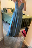 I read the reviews that this runs large and to size down. I'm so glad I did because it fits perfectly.
The material is really nice and I love the sticky material on the shoulders to prevent it from sliding down. Can't wait to wear it for the wedding I am in! - Liz P.