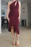 I wanted to love this, but it was just a tad too snug and the strap was a bit too loose. Maybe sizing up and alterations for the strap would've helped, but I decided to return and find something else. - KELSEY T.