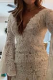 This dress is amazing! Totally fell in love with it as soon as I tried it on. The quality of the material is wonderful. I'm curvier in the hips and it fits me like a glove. Can't wait to wear this on my wedding day! - Hayley B.