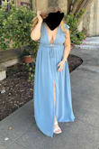 Beautiful dress. I think it's perfect for busty gals! My boobs looked beautiful and I didn't need tape. The XL was a little big, but the L didn't zip all the way, even though it fits perfectly everywhere else. - Maddison P.
