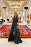 This dress was so gorgeous! I received so many compliments when I posted a photo of myself in it. The dress fit perfectly and with heels, I didn't need any alterations to make it shorter as it floats around you when walking so didn't have any issues stepping on it. The color is rich and elegant and the material looks expensive. And like everyone else said: POCKETS! It does take time to steam/iron out the wrinkles, but it's worth it. - Amanda F.