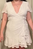 I was so sad to return this one because it was so cute but it was just slightly tight enough around my waist to where it was uncomfortable and gave the illusion of back rolls on the back TT. It was also a little loose on the chest but would've been too big if I sized up. - Megan V.