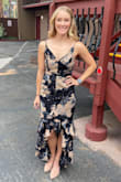 I have worn this dress to two weddings now and always get a ton of compliments on it. It has a slight elasticity to the back so it fits nicely. Very easy to dance in as well! - Noelle N.