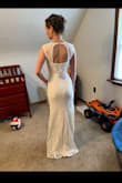 Pretty bright white dress with gorge detail. - Katelin Z.