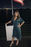 This dress is wow! It fits so well and the color is so pretty. I got so many compliments. I added a safety pin to the front because the opening it's quite low. - Dannaly R.