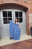 I am shorter and we were planning on hemming it but when we got it and I put on heels, it like barely touched the floor. Definitely a "low-key" prom look but I loved it! There is a lot of fabric so be prepared to pick it up when walking around. - Kayleese T.