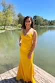 I wore this dress for a photoshoot and again for a cocktail attire wedding rehearsal night because I love it so much. I get so many compliments.  The stretch is perfect and very flattering.  I needed the large hemmed just an inch to wear with medium heels. The straps adjust also which was great. The v in front is not too revealing and the material worked great with Spanx or seamless panties and Nippies. I will find more reasons to wear this dress. - Leah C.