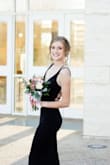 We ordered this for my daughter's prom. She wanted simple with a deep-ish front and a strappy back. This dress fit like it was made especially for her. A custom-fit couldn't have been achieved any better. The bust, waist, hips, and length (with 3" heels) were spot on! The weight of the dress is ideal with the lining underneath. The quality of the craftsmanship was perfect (especially for the fabulous price!!!), which was better than I expected. I will say though that we ordered an XXS and an XS. The size we didn't keep (XS) did have one strap across the waist that was too long. So overall the quality of my total order received was 50%. We received our order within 5 days! The return process was very easy and simple. My daughter loves her dress and felt beautiful at prom. Note: some pilling along hem after wear. This is my second purchase from Lulus. Our first purchase was a dress ordered for fall 2021 for homecoming (another perfect fit and 50% quality result). I will absolutely be buying from Lulus again! - Melissa B.