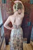 I wore this dress for my senior prom and it looked exactly how I imagined it would! It was so flattering and definitely accentuated my waist because of the corset bodice. It was super long so I had to get it hemmed, but it would probably work perfectly for a taller person. When I ordered it I was a little bit worried that it would be see-through. However, there are two white slip skirts underneath so I didn't have that issue at all! I was also worried that this dress would fall down on me all night with it being strapless, but it stayed up regardless of how much I jumped and danced around. I got endless compliments on my dress all night too; it really stood out! I really have no complaints about this dress, don't hesitate to order it for a special event! :) - Lauren S.
