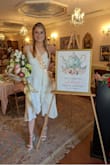 I struggled to find a dress for my bridal shower which was tea-themed, but this worked perfectly! I paired it with Lulus sandals and a pearl bow! It was a bit loose in the chest area, but would not get a different size. - Lindsay G.