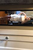 Doesn't lay exactly the way you hope. It's a pretty dress but just looks different in person and on. Much more of stretchy material than expected. I ordered a medium and you can tell it's pulling in some places, disappointing. - LeAnna L.