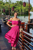 The color is beautiful. Skirt is light and billowy. Fabric is thinner than I anticipated, but nice.
Very long, which was perfect for my 5'11 height and long legs.
The top of ok. I don't love it, it felt cheap, but it did look cute together. My husband didn't love the top either.
The skirt I wore several times with different tops of my own.
It's very pretty and a beautiful vacation outfit. - Lori F.