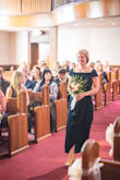 I didn't wear off the shoulder like stock photo model, but as more of a capped sleeve look. It was flattering on all the bridesmaids and very comfortable for all day wear 
It's not as scandalous as stock photos make it seem :) - Katie H.