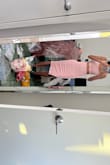 This fit like a glove! I'm usually between a S and XS but decided to go for the sexier fit and I'm so glad I did! Definitely on the tighter side so watch your undergarments but super comfortable and I love the blush color - I feel like the girl in the photo! - Renee M.