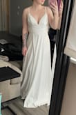 I love this dress, it fits absolutely perfect! I need it hemmed obviously because I'm only 5'3 but the rest fits so well. I bought this as a second wedding reception dress for later at night and it's perfect for dancing, I feel secure in it. And it's good quality too! - Kate L.