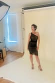 Love this dress. Ruching hides problem areas, but needs to be adjusted one in a while. I did put in bra pads to cover my nipples...which did show through without them. Otherwise the dress was super comfortable, sexy, and very elegant. I wore it for a photo shoot I did with a local photographer who is photographing 40 women over 40. - Lara H.