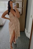 This dress was perfect. The lace is a little more predominant in person but it was still beautiful! I had to get it shortened but other than that no other adjustments were needed. - Olivia S.