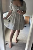 Superrrr cute and comfy dress. Usually a L in bottoms and M in tops --- went with  M and it fit perfect. - Nancy C.