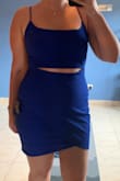 This is the perfect dress for a pear-shaped woman like me. Hits every curve and makes you look AMAZING! I can't wait to wear this out. Definitely keep your normal size or size down. I probably could've worn a medium as well. - Anna T.