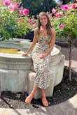 I ordered an XS and it fits me perfectly! It was the perfect dress for Napa Valley for an early spring bachelorette trip! The dress is lightweight and super soft! I am 5'8, 34 A bra size. This dress might be hard to wear if you have a larger bust as there is no support in the top. I love this dress and can't wait to wear it again. - Morgan Y.
