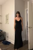 The dress is the perfect length if you're a bit on the taller side like I am, I would imagine anyone under 5'7 would have to hem this dress or wear really tall heels. It's a really nice heavy material but still a little stretchy and very comfortable. The zipper gets stuck around the waist area and I always have to have someone else zip me up because of the fabric in that spot for some reason. I'm wearing it to a black-tie wedding and it's perfect for that. - Channing V.
