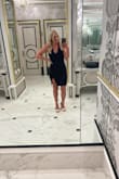 This dress fit like a glove. The material was stretchy yet form-fitting. I had ordered 7 dresses before this one! The slit can ride up a bit but just be mindful obviously. Seriously loved this dress so much! Also hid my "mom pouch" very well!! - Brooke G.