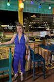 I bought this jumper for my vacation in Aruba. The lightweight material was great for the warm temperatures. I'm average height- 5'5 so the length was perfect! The top has just the right amount of cleavage. I wear a size 34D bra and was semi worried about the ladies be contained all night but the straps are self tie so I was able to tie the top portion tight enough and in the best way for me. - Amanda S.