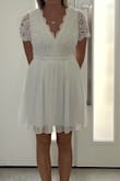 This dress is beautiful in person, I received so many compliments at my bridal shower. The fit was perfect and the lace was gorgeous. - Jaimie G.