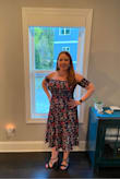I'm actually a 34G sometimes and this fit great! I was worried that my chest would fill up the whole top part but I don't. I'm short, and this was a nice length for me. Definitely midi, not maxi. Wore it with a jean jacket, didn't have to fidget in it. I wore a sticky bra. - Katrina B.
