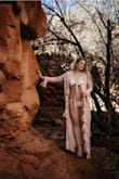 I feel like a goddess in this suit and my husband absolutely loves it too. I think the top is elegant and feminine but super sexy on a curvy body for sure! I paired it with Lulus Sun kissed sweets cover-up, rose gold sandals and a beige sun hat. It's only spring right now, but I put the suit on as the finishing touch on a romantic stay at home date during the pandemic quarantine. Just lovely and perfect fit. I am 5'5" weigh 145 with 36D and hourglass shape, the large top and bottom fit like a dream! The tie top allows some flexibility in terms of how much cleavage you want to show. - Judith D.