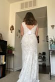 I saw this dress, as it was the style I wanted it. However, it didn't give a wow factor for me. When trying it on, it was tight, in the bust & waist area. The return was easy & got a refund within a week's time. I ended up choosing & loving another Lulus Dress. Overall, it's a beautiful dress; just size up if you have a bigger bust/hip area. - Erika G.