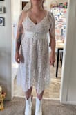 True to pictures, ordered up a size cuss sir was recommended, glad I did it fits great. Going to wear it to my after party for my wedding, and added a belt. Definitely can recommend this dress. Good quality - Jaclynn G.