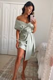 This dress was the perfect selection as a wedding guest!! I received so many compliments and loved how flattering it was. I did originally order a small and had to size up only due to it being too tight in the bust area. Otherwise, no issues. Love love love! - Kailyn M.