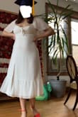 This dress was the perfect midi for my graduation. It's nice and flowy but has a sexiness to it. I will warn for larger busts, the top is low cut. The medium fit fine and the bow made it more modest but I will have to be weary if I bend down. Other than that, I love the style so much - Sydney V.