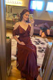 This dress is so incredibly comfortable! I love that you can make it as loose or tight as you like (I definitely loosened it after the wedding feast). The color and fit are exactly what you see in the photos. The top fabric is silky and gorgeous, there are two layers. It is long but I didn't need any altering when I put heels on (I'm 5'7) - Allison L.