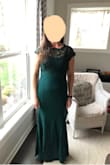 This dress fits beautifully. If you can get the zipper to go up. It was a huge struggle to get that zipper up or down even when I wasn't wearing it. I have to return it because of it. - Stacey P.
